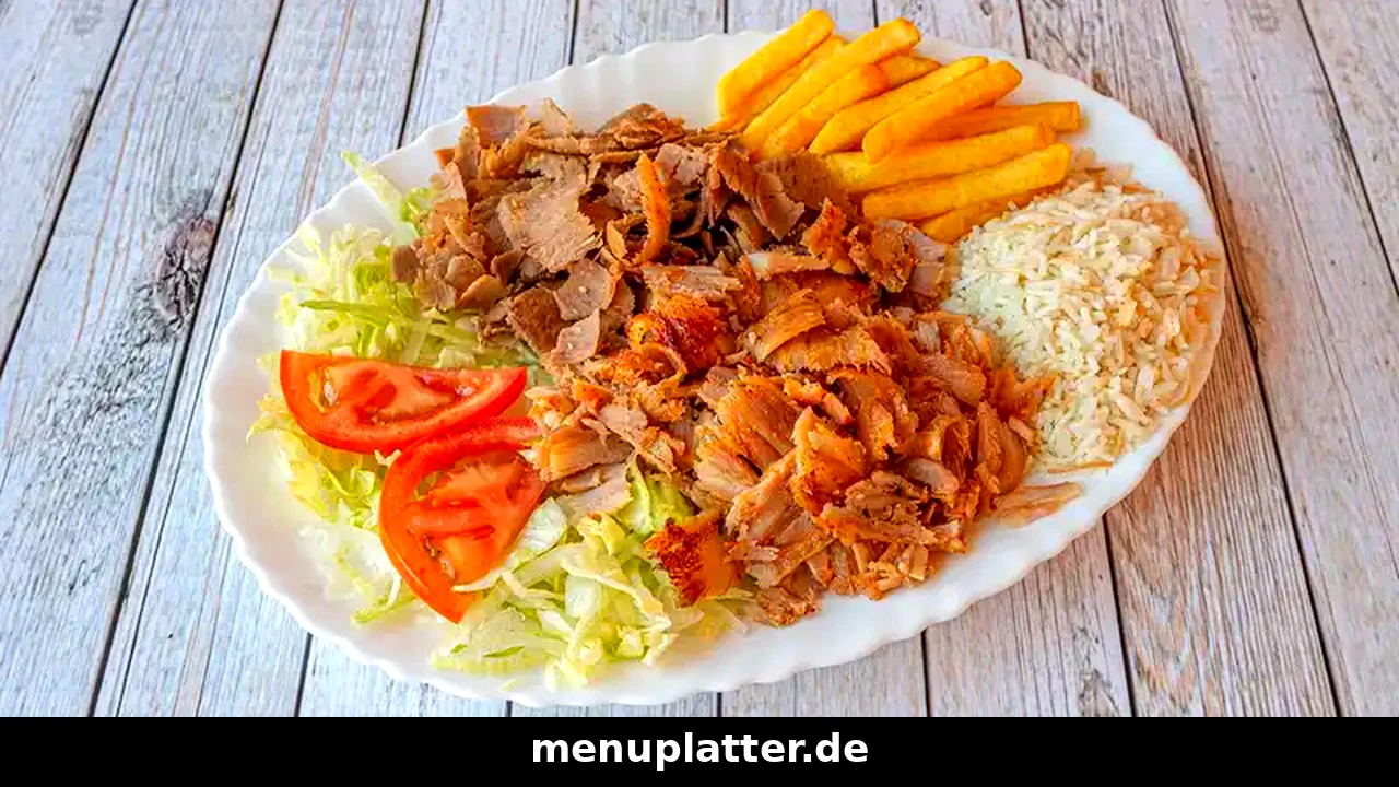 Haus des Döners Preise Dortmund mit einem Dönerteller mit Dönerfleisch, Reis, Pommes frites, Salat und Tomaten