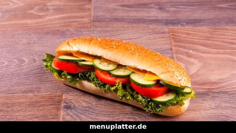 Subway Germany menu prices with a fresh chicken sub, salad, wrap and cookies on a counter